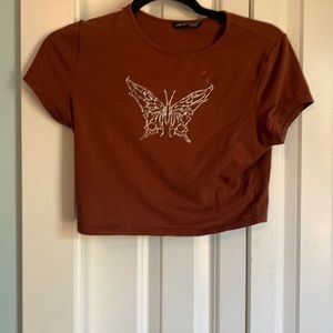 Cropped brown top with butterfly decor